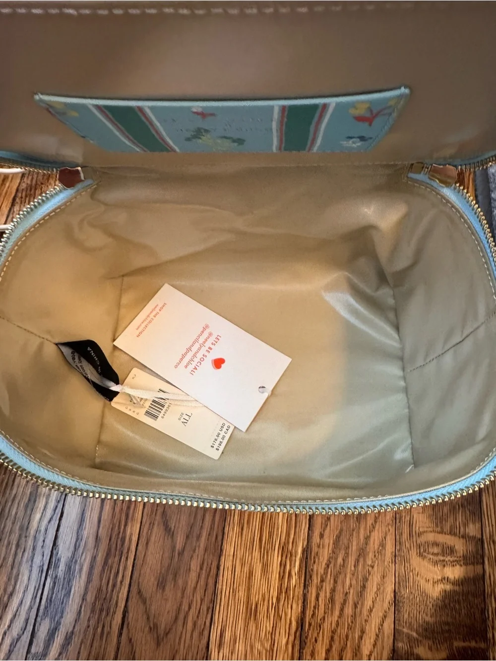 Pencil & Paper Co x Neely & Chloe Stripe Cosmetic pouch with Top Handle and Zip